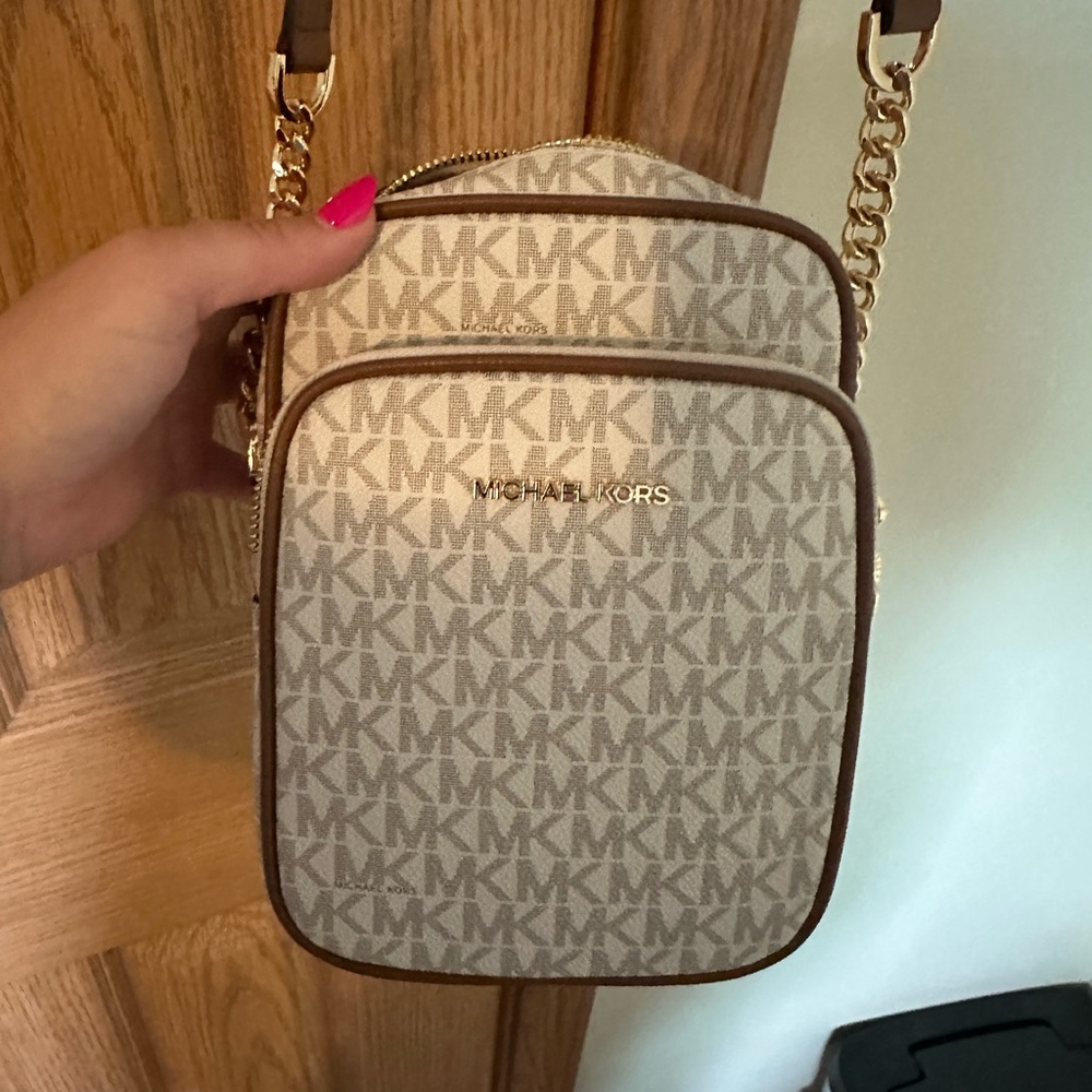 Authentic Michael kors jet set new with tag crossbody with gold accents